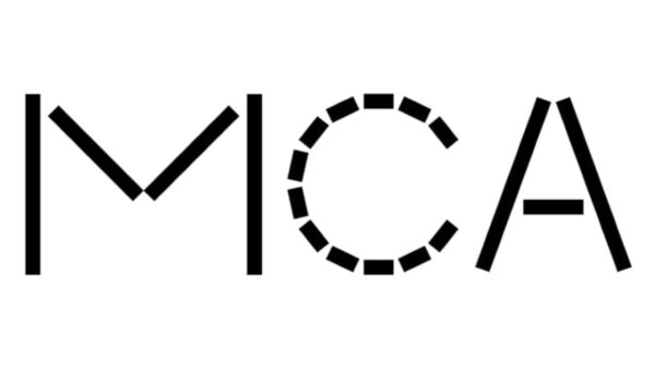Black stencil font reading MCA against a white background. The M and A use long dashes, the C uses short dashes.