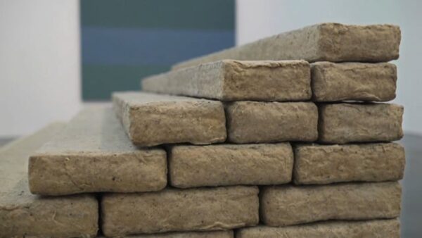 2x4-like objects are stacked to create a five step staircase