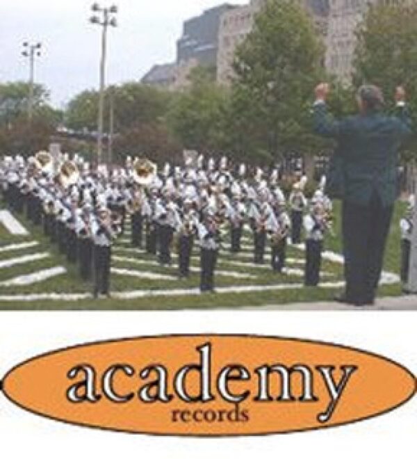 A conductor faces a marching band lined up in four rows in the MCA's backyard. The academy records logo appears beneath the image