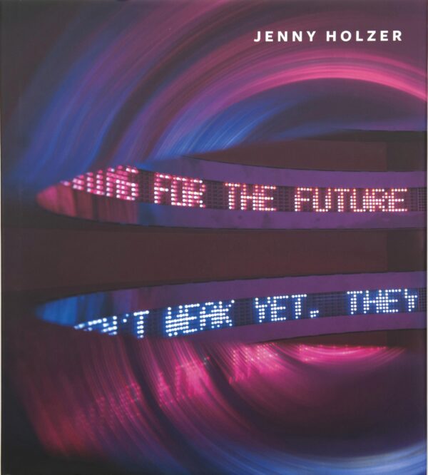 Cover for a book on Jenny Holzer featuring one of her artworks with two ticker signs, one with pink text, one with blue, in an arched corridor illuminated only by the signs