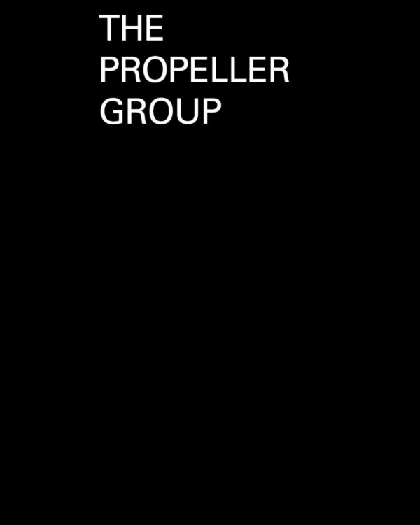 A black book cover with white text at the top reading The Propeller Group