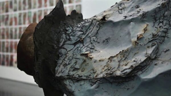 Close up of an aged object resembling a space capsule