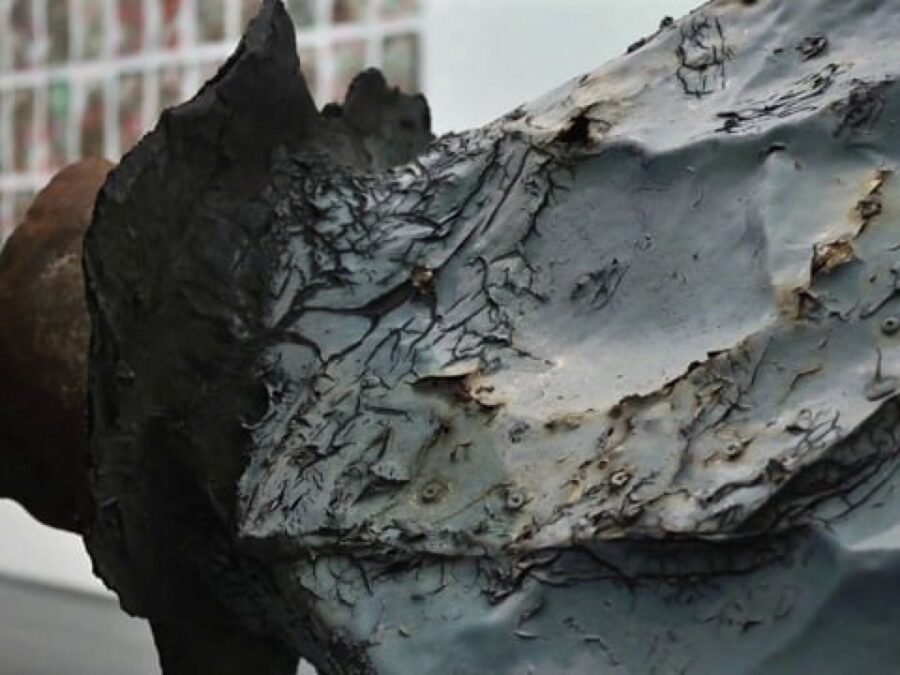 Close up of an aged object resembling a space capsule