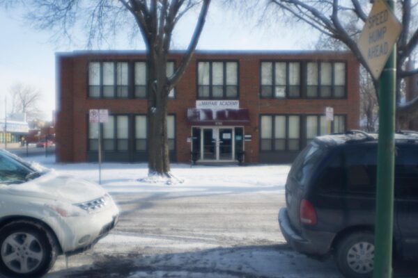 A school as viewed from the other side of the street on a bright winter day