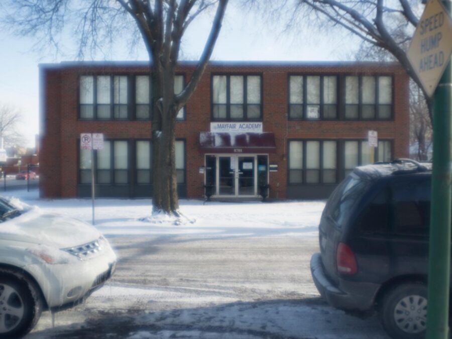 A school as viewed from the other side of the street on a bright winter day