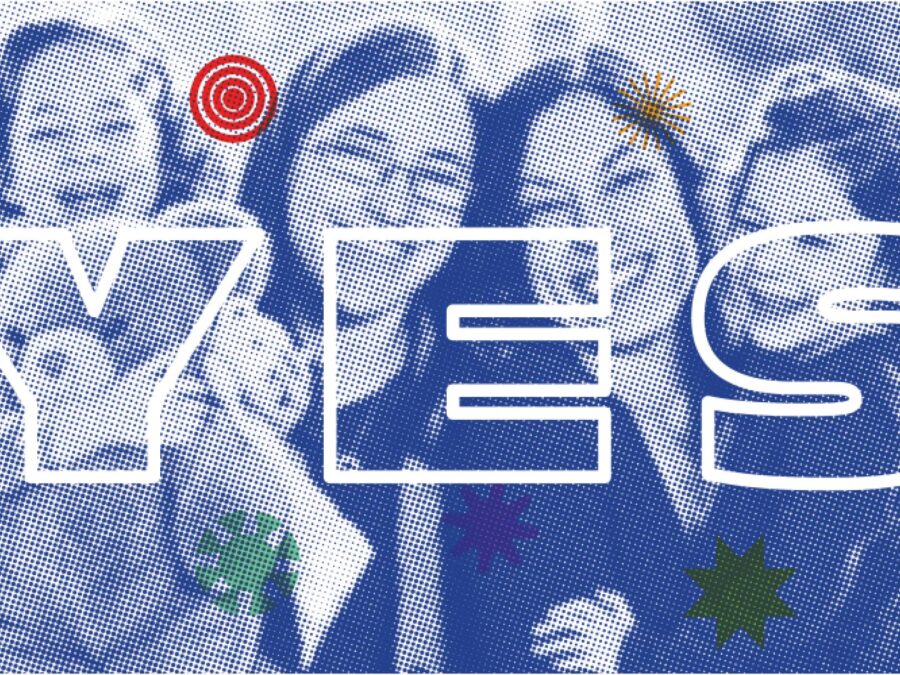 Two adults hold two children in this blue pixelated image with the word Yes spelled out over it in white outline bubble letters. Fun colored shapes surround the text.