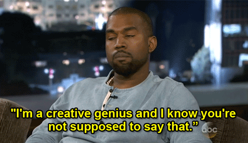 Kanye West sitting in a grey t-shirt with yellow captions over reading I'm a creative genius and I know you're not supposed to say that.