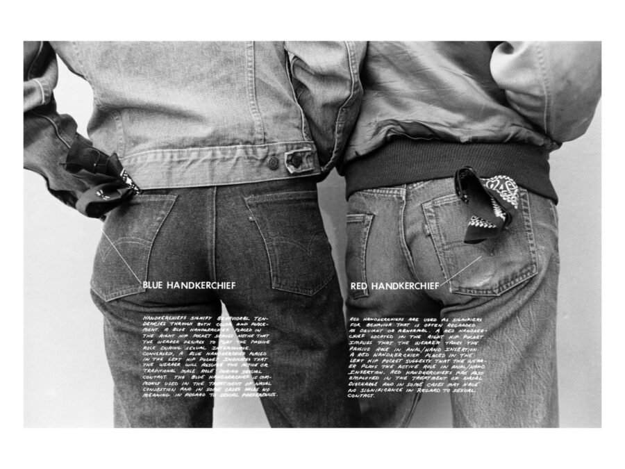 Black and white image of the backsides of two people wearing jean jackets and pants. The image is cropped to their midsection. White text reading Blue Handkerchief and Red Handkerchief is overlaid across their respective buttocks with longer text below each heading.