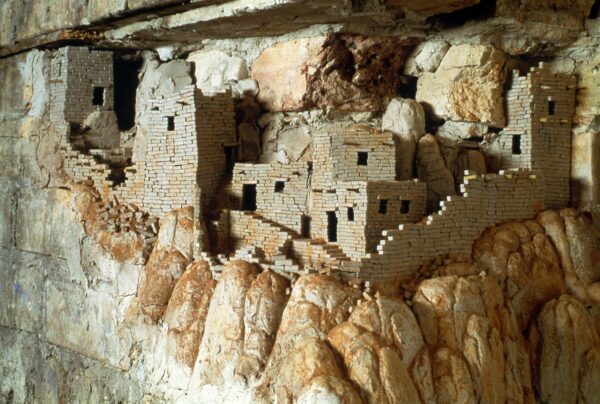 A village seemingly built into and out of the hill it is carved into.