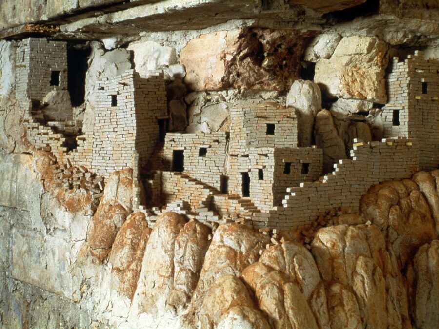 A village seemingly built into and out of the hill it is carved into.