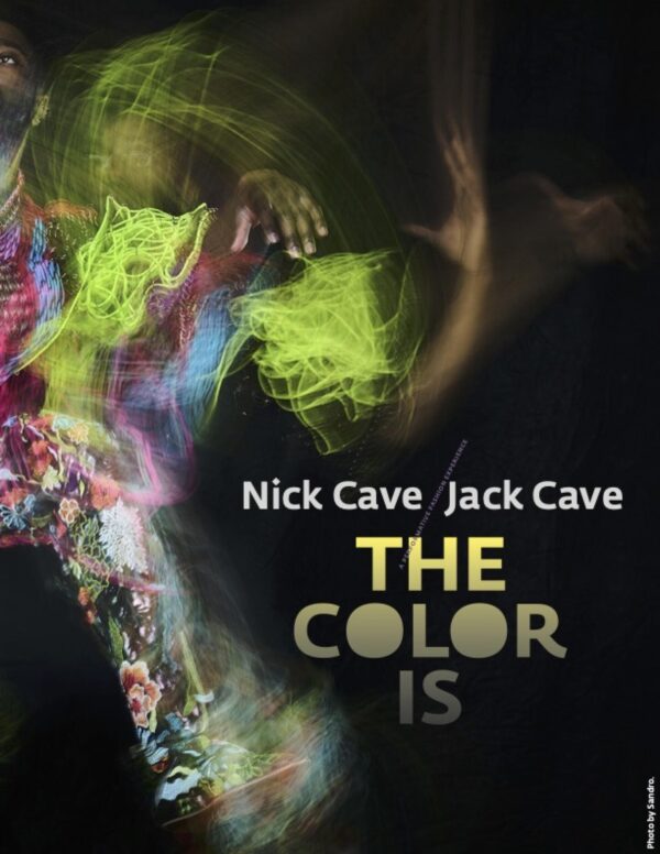 Two people in a colorful haze against a black background with text below them reading Nick Cave Jack Cave The Color Is
