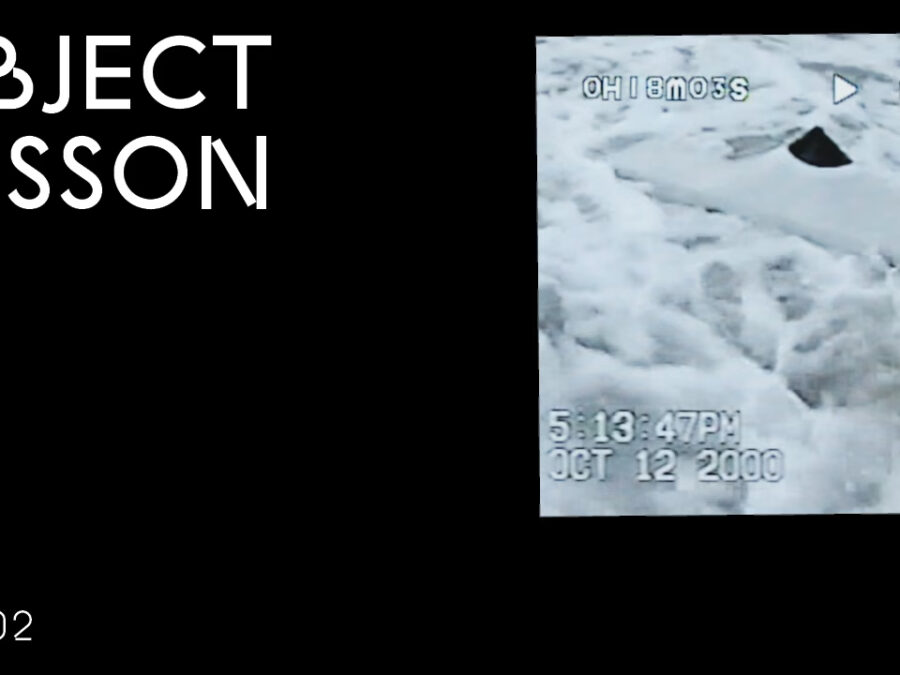 A black rectangle with the words Object Lesson in the upper left hand corner and OL 002 in the bottom left hand corner accompanied by a blue-gray image in the upper right hand corner