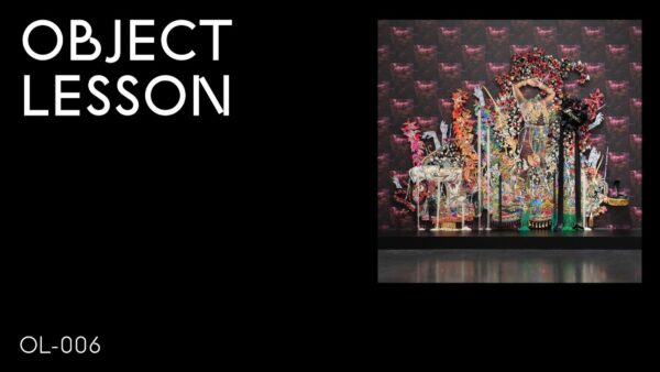 A black rectangle with the words Object Lesson in the upper left hand corner and OL 006 in the bottom left hand corner accompanied by an image of a colorful wallpaper and floral installation in the upper right hand corner