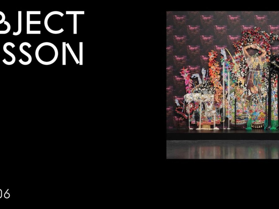 A black rectangle with the words Object Lesson in the upper left hand corner and OL 006 in the bottom left hand corner accompanied by an image of a colorful wallpaper and floral installation in the upper right hand corner