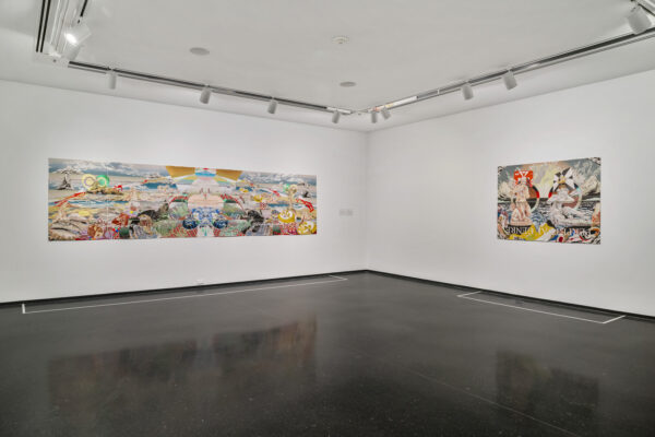 Two paintings hanging on a white wall