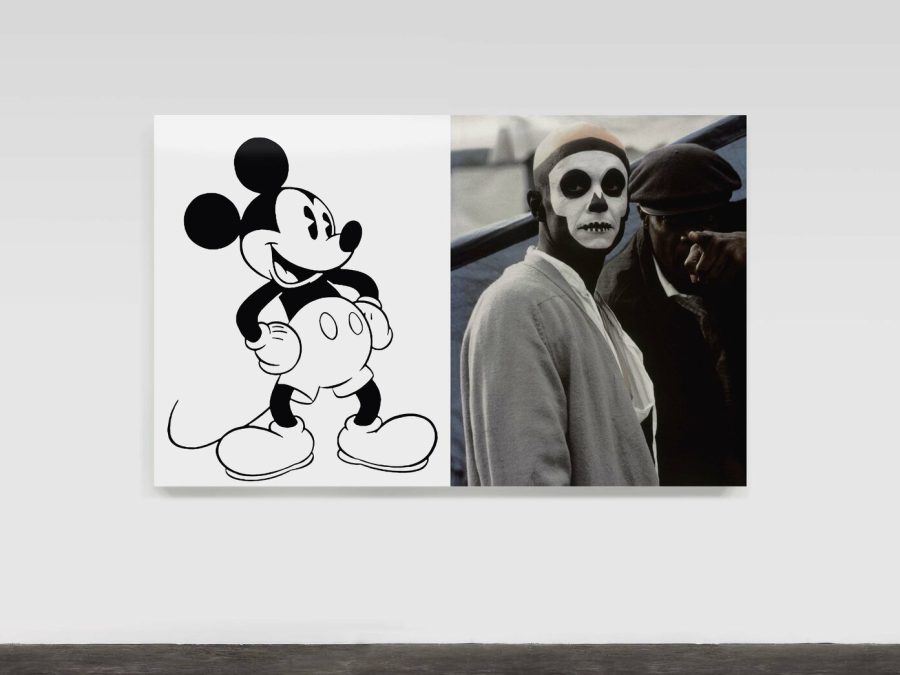 Artwork installed on a white wall. The left side of the artwork is a black and white illustration of Mickey Mouse. The right side of the artwork is a black and white photo of a person with skull makeup on their face.