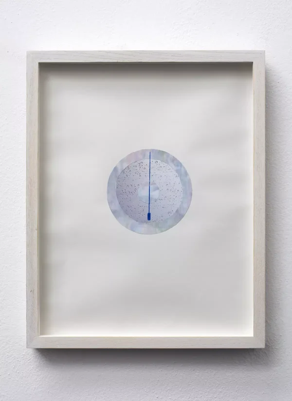 circular elements overlap in center of white paper