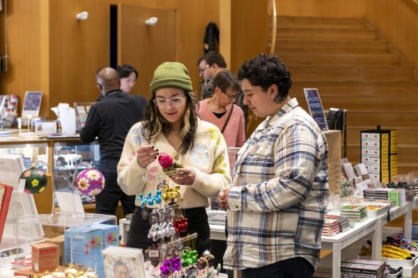 Several people looking at objects in a store