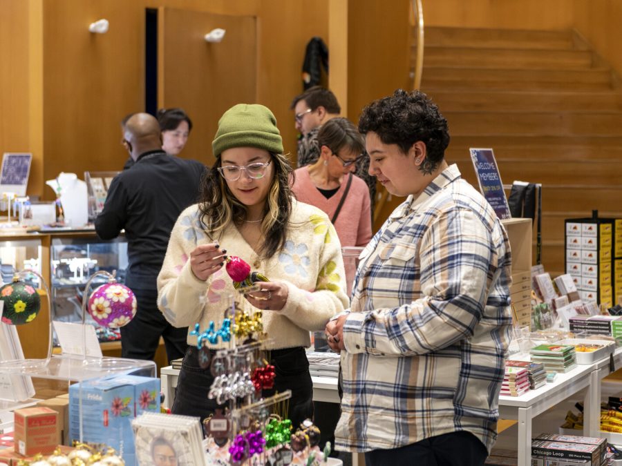 Several people looking at objects in a store