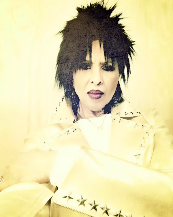 A yellow filtered portrait of Nona Hendryx