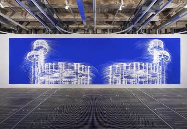 Photo of a long horizontal artwork depicting architectural shapes in white on a royal blue background.