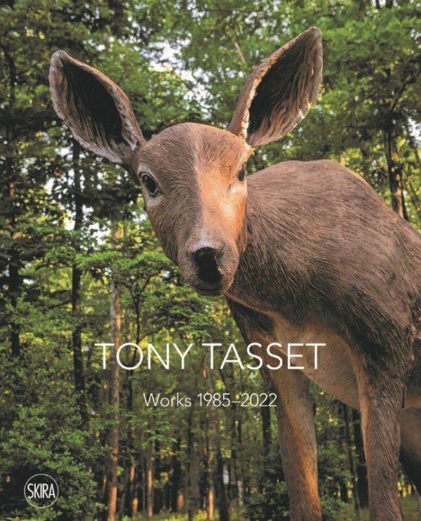 Cover image of a Tony Tasset book featuring an image of a plastic deer in a wooded area.