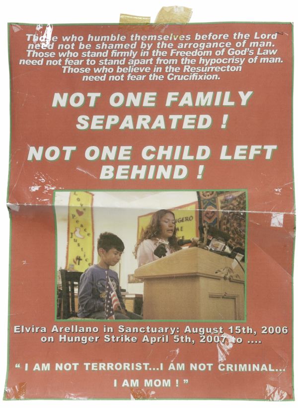 A tattered poster reads: 
