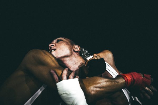 Two performers in boxing gear.