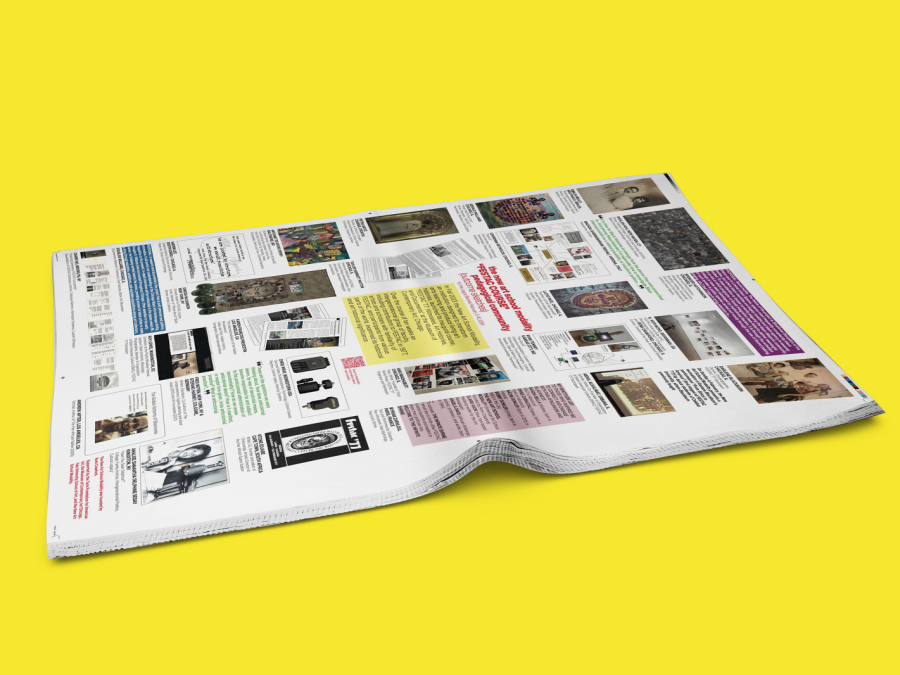 A side view of a newspaper against a yellow background