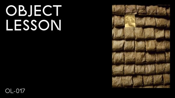 A black rectangle with the words Object Lesson in the upper left hand corner and OL 017 in the bottom left hand corner accompanied by an image on the right hand side of rows of tea bags interrupted by one portrait in the second row