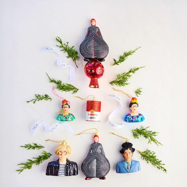 Ornaments including two David Bowies, two Frida Kahlos, a Campbell's Soup can, an Andy Warhol, and a Jean-Michel Basquiat are surrounded by springs of rosemary in a formation resembling a Christmas tree