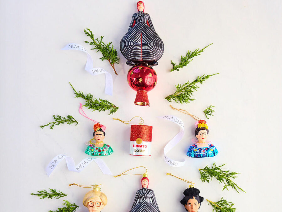 Ornaments including two David Bowies, two Frida Kahlos, a Campbell's Soup can, an Andy Warhol, and a Jean-Michel Basquiat are surrounded by springs of rosemary in a formation resembling a Christmas tree