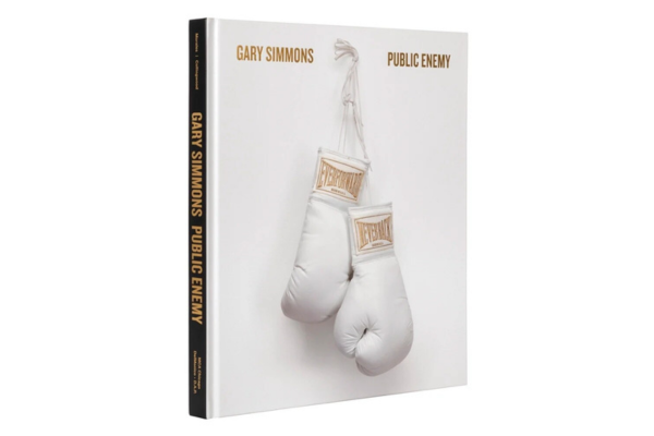 Exhibition catalog for Gary Simmons, Public Enemy, featuring two white boxing gloves on the cover.
