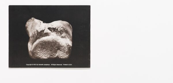 The back of a book featuring the end of a piece of bread against a black background. Below the image is white text reading Copyright 1973 by Kenneth Josephson. All Rights Reserved. Printed in the USA.