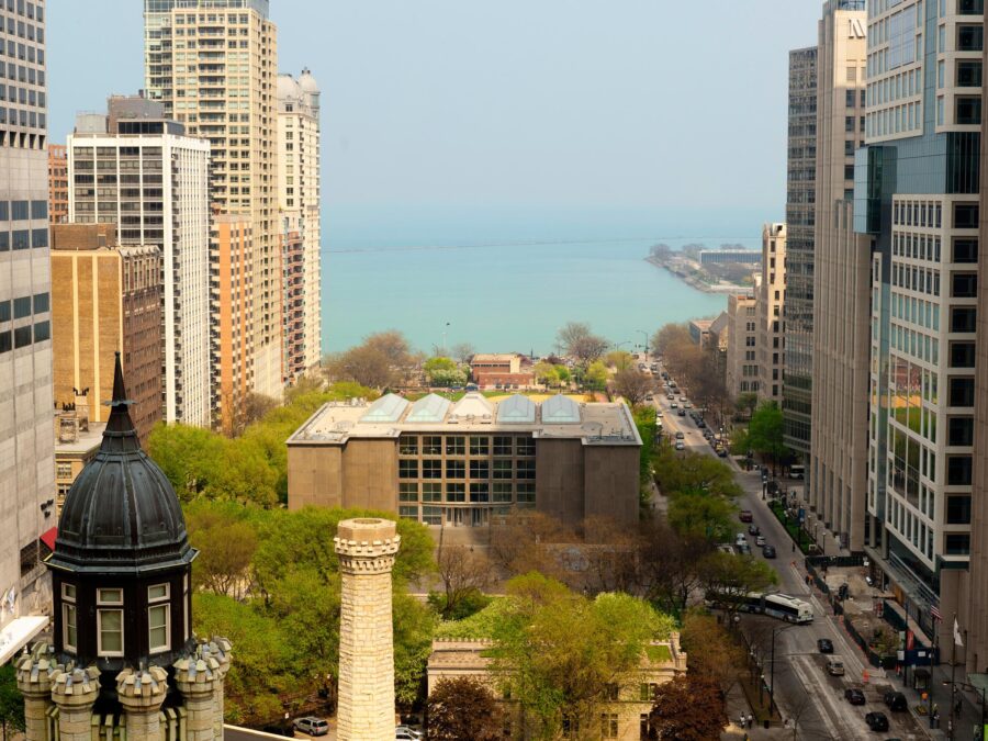 An aerial photograph captures views of the MCA, Lake Michigan, and surrounding buildings.