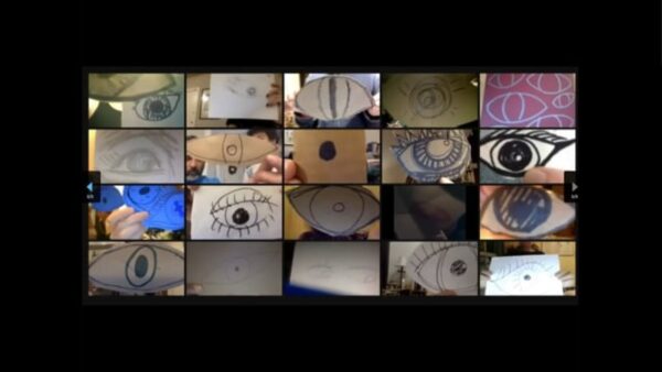 A four by five grid of various photos of hand-drawn eyes against a black background