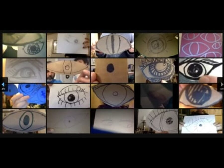 A four by five grid of various photos of hand-drawn eyes against a black background
