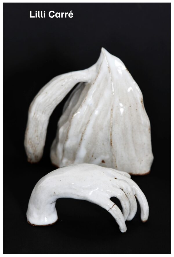 Two white ceramic sculptures, one resembling a bent hand, against a black background. Above the image is white text reading Lilli Carre.