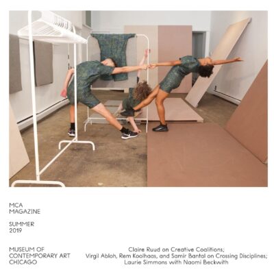 The cover of the MCA Members' Magazine for Summer 2019 with an image of three performers in a tug and pull around two white clothing racks