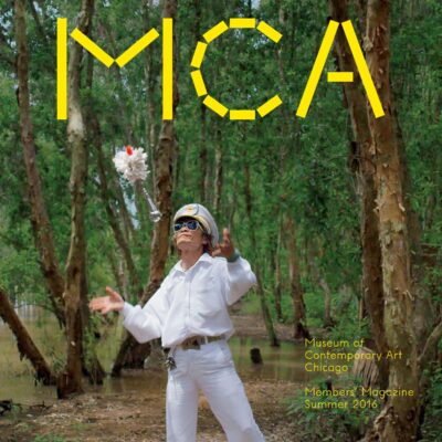 Cover of the MCA Members' Magazine for Summer 2016 featuring a person in a white captain's outfit in the middle of a forest tossing a feathered baton into the air