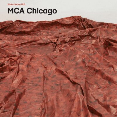 Cover of the MCA Chicago magazine for Winter Spring 2015 featuring a rusty red fabric spread out with several folds