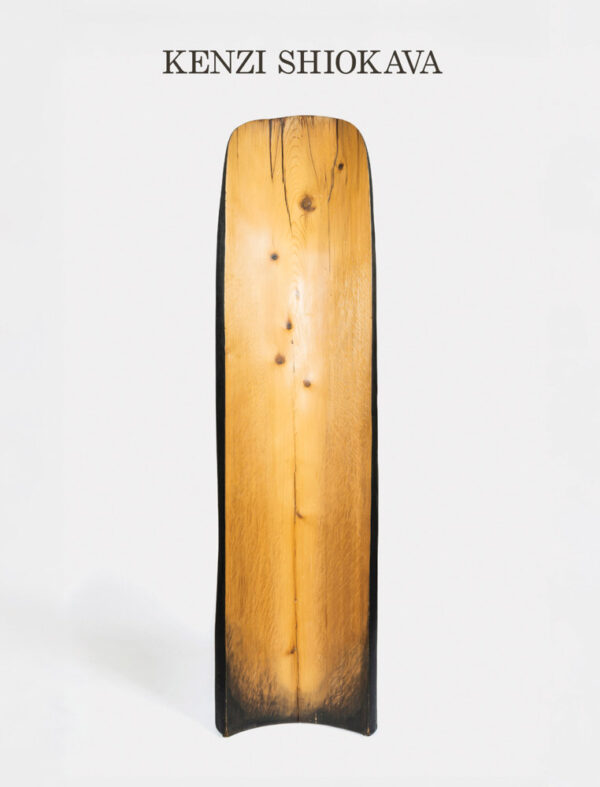 Cover of book titled Kenzi Shiokava featuring a planed tree trunk positioned vertically, with gold, shiny grain that is highlighted by the almost burnt sides