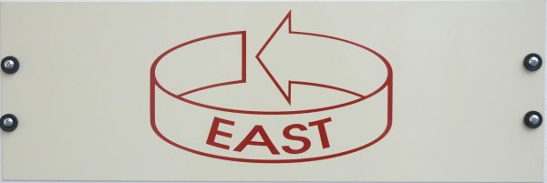 A red arrow pointing at itself in a circle with the word East in the middle of it