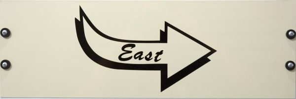 An arrow pointing to the right with the word East in the middle of it