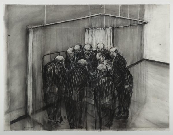 A group of men all wearing striped business suits all crowd around a hospital bed, it's white curtains pulled back.