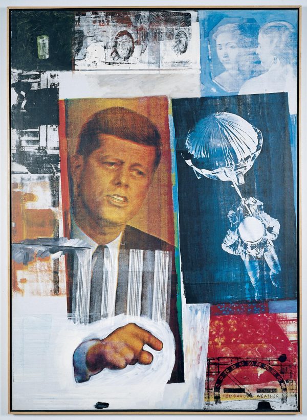 An image of John F Kennedy, painted in orange colors, points to the right toward a blue image of a person in a space suit with a ball-shaped object strapped to their back.