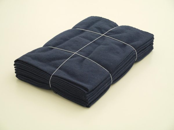 A blue blanket tied with three strings