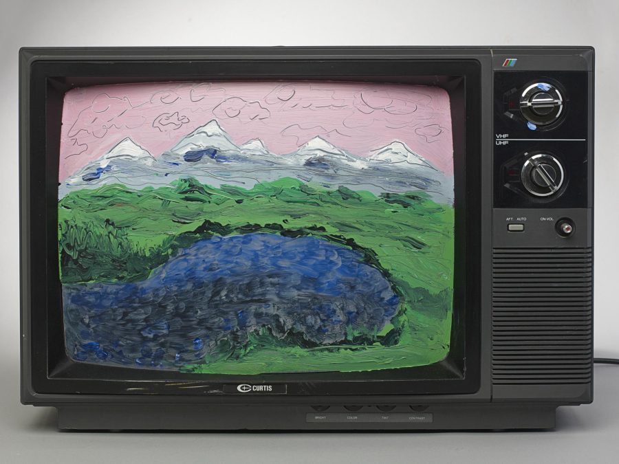 An older television with the screen painted with the scene of a lake and mountains in the background under a pink sky in thick brushstrokes