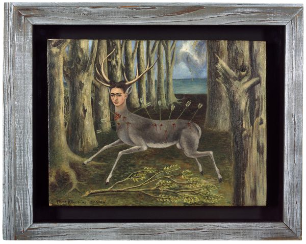 Painting of a male deer featuring Frida Kahlo's head in a wooded setting. The deer has five arrows in its back.