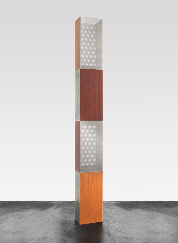 A tower made out of wood and metal